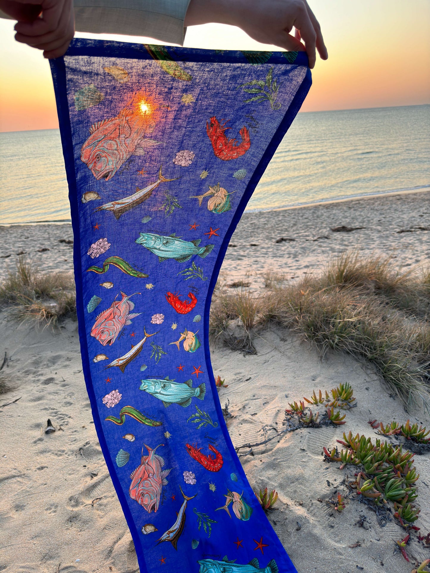 The funky Fishing for Fishes table runner meets the ocean.