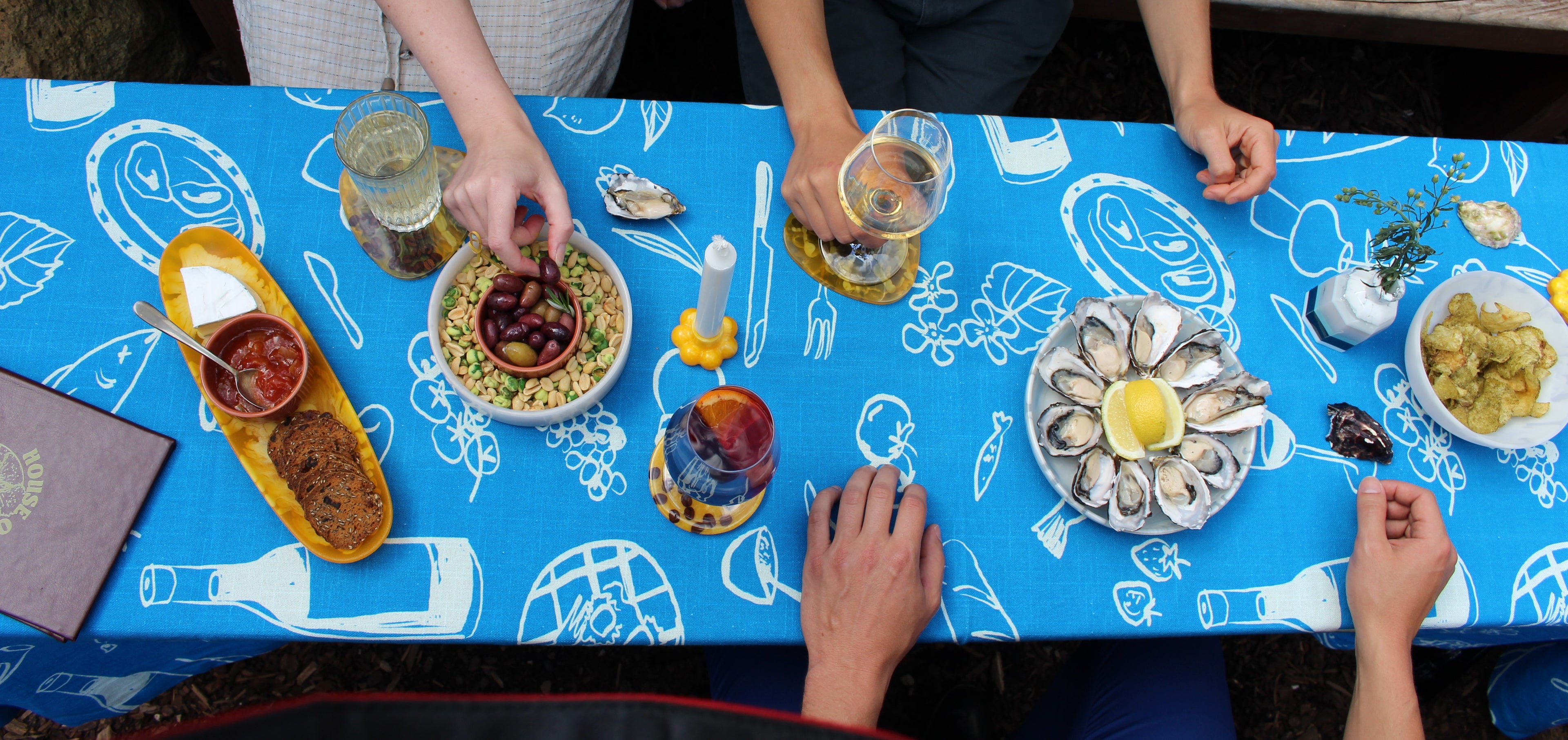 Are tablecloths out of style in 2024? blue feast 