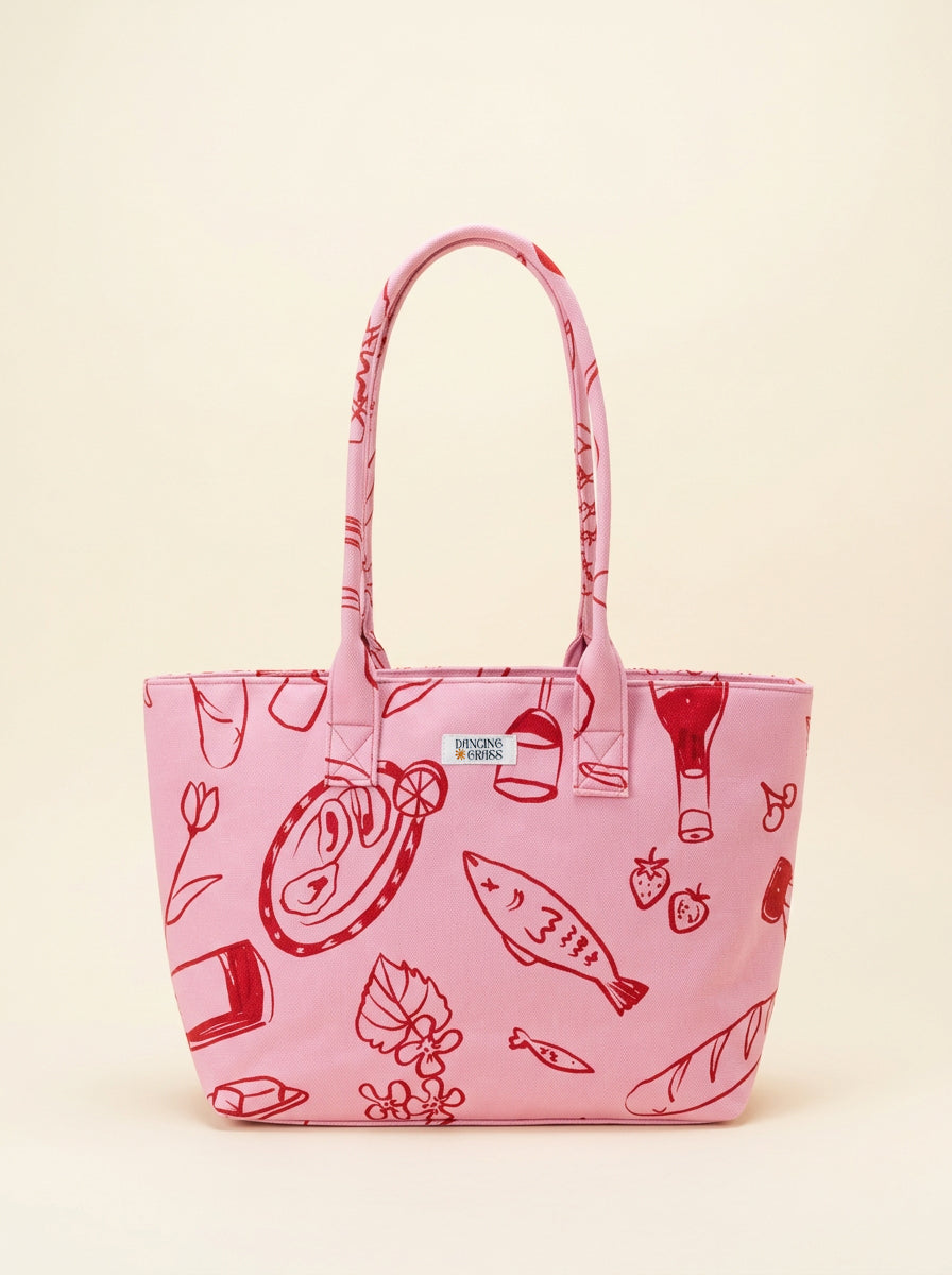 Pink tote structured bag with red illustrations on a beige background
